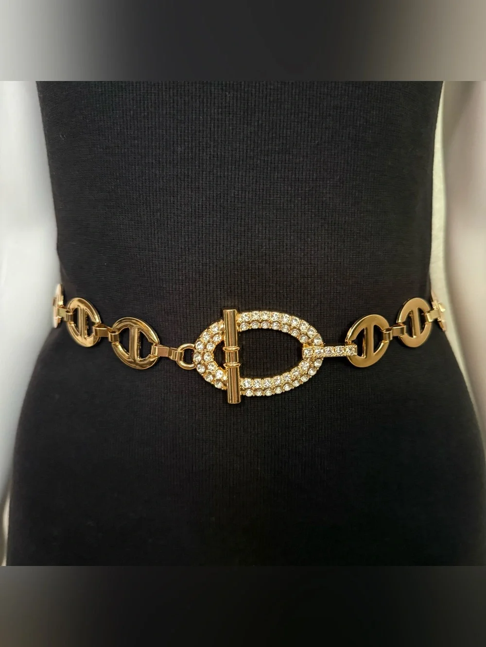 Gold tone metal chain belt with rhinestone details